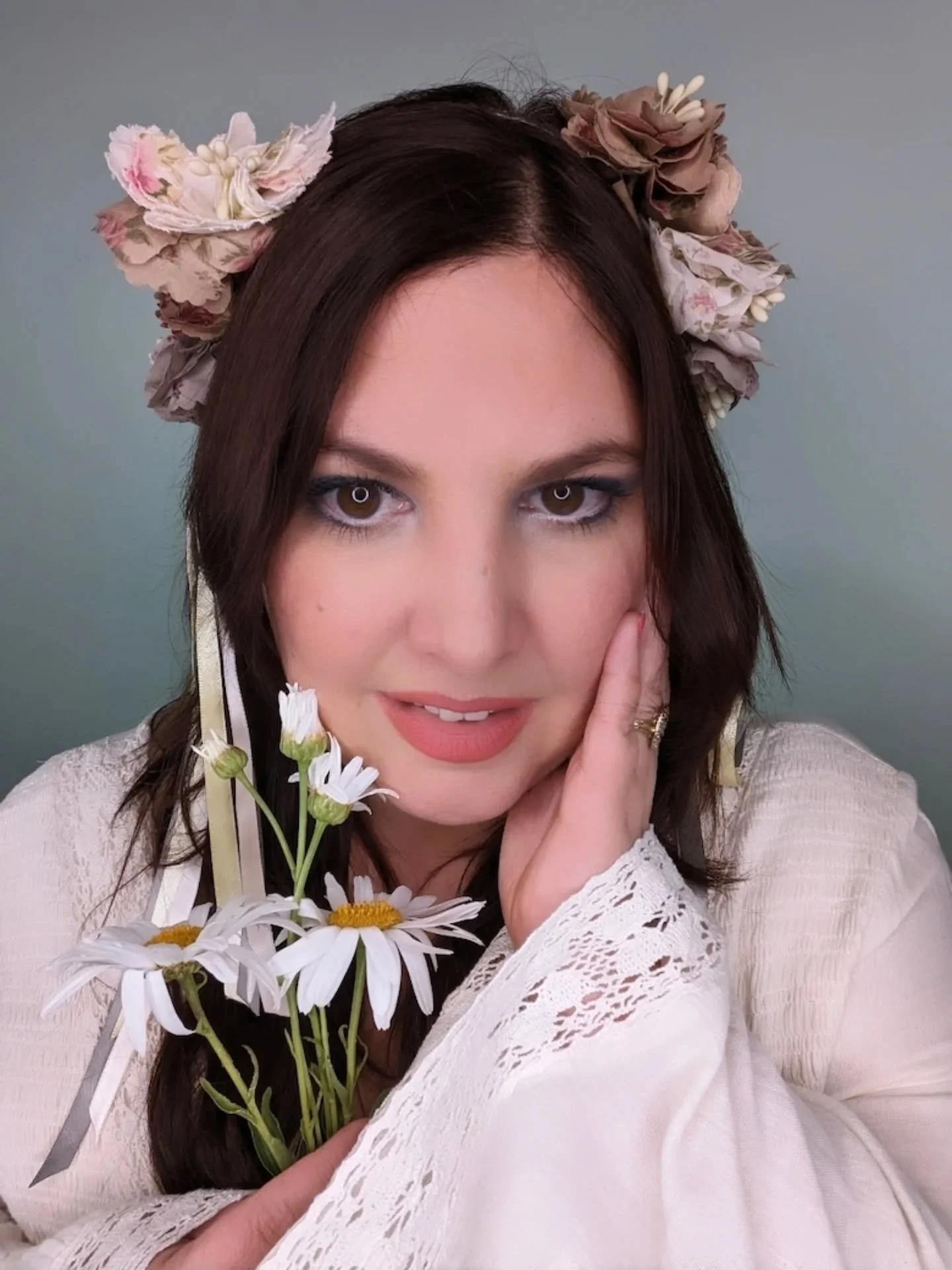 A little bit of whimsy&mdash;🌼🌼🌼

BLOOM  is a headpiece that whispers of wildflower fields and sun-kissed days.

Handcrafted from delicate vintage fabric petals in fall tones, with satin ribbons that float like a breeze. Part of our ' Petals in th