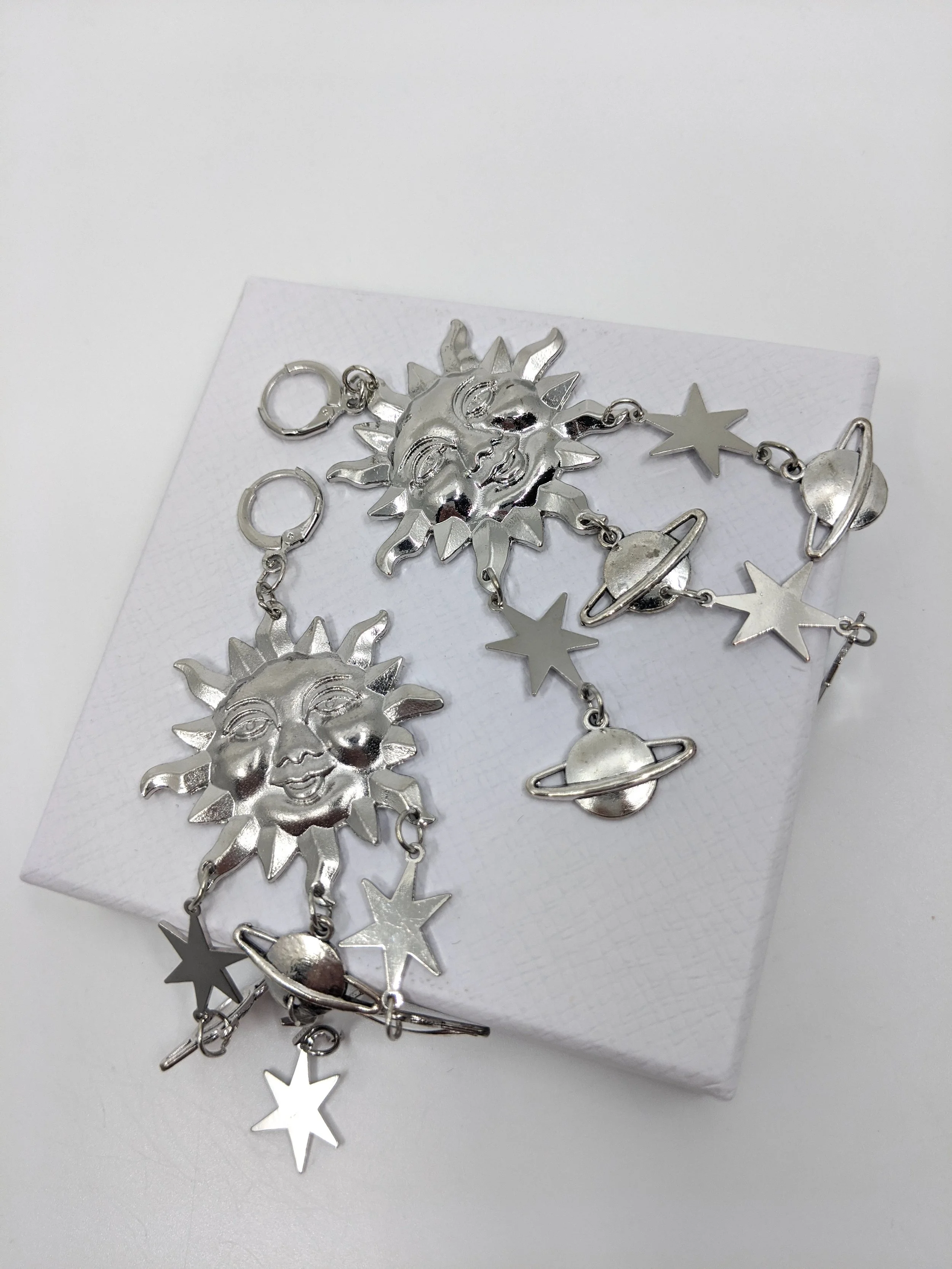 The House Of Hats Silver Sunshine Earrings Millinery Australia .jpg
