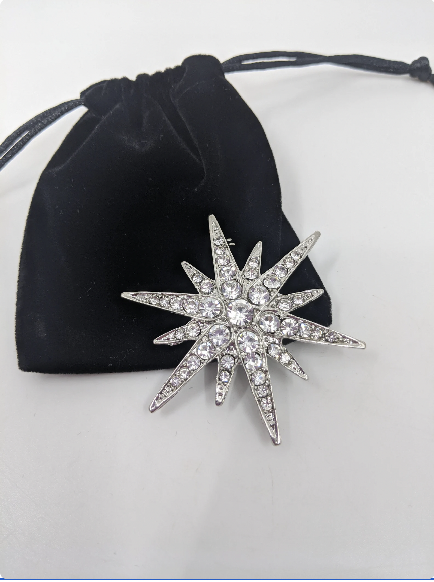 The House Of Hats Orion Silver Starburst Art Deco Rhinestone Brooch .png