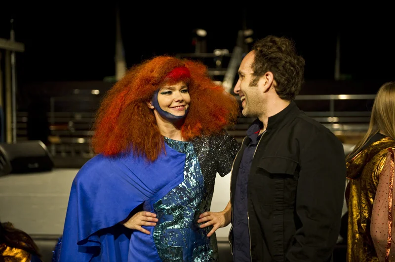 Björk in her amazing spliced mini-dress/evening gown with Scott Snibbe at rehearsals