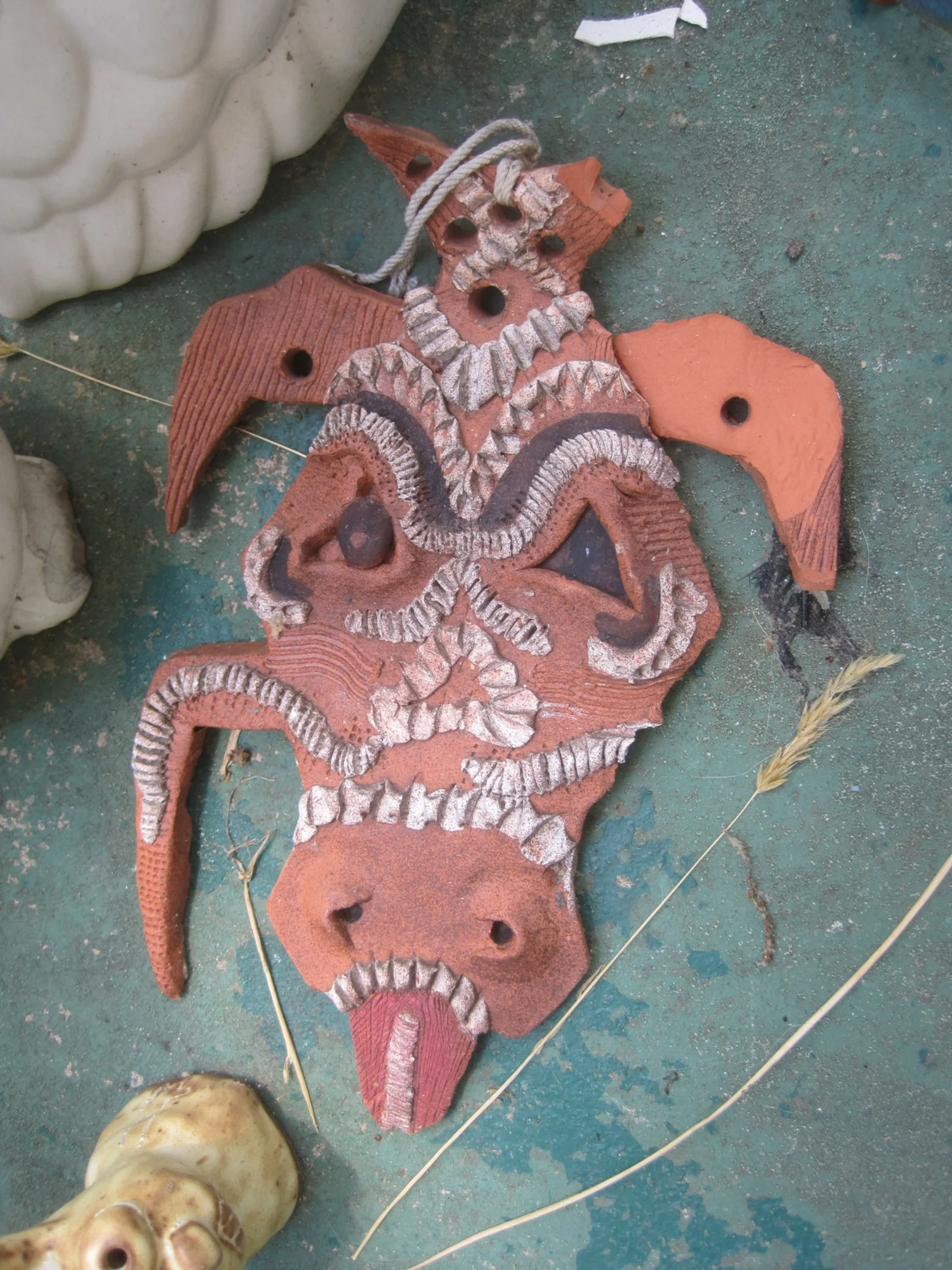 An early clay mask from my middle schools days. Harkens back to my African childhood. 