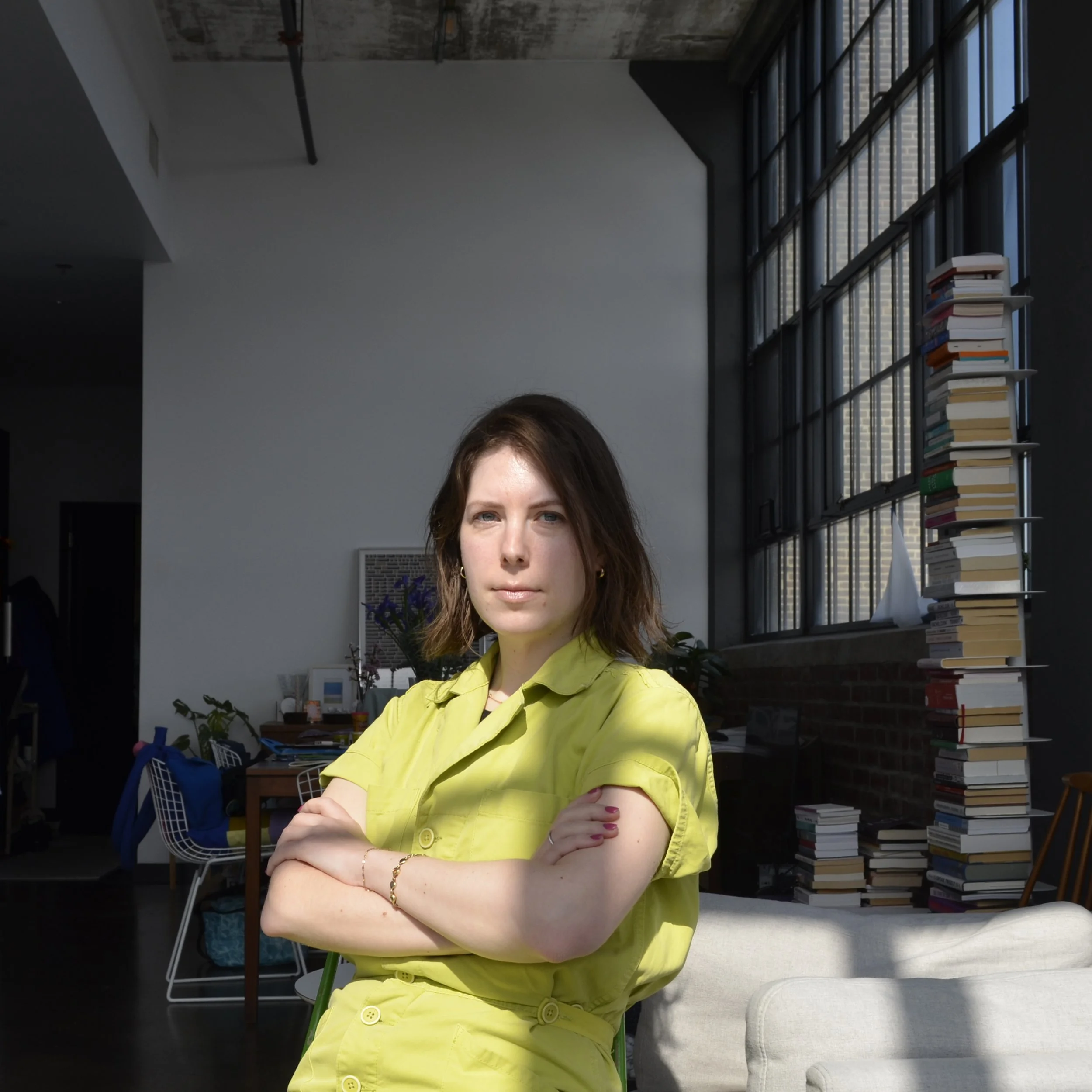 Self portrait of the designer and artist in the studio space.