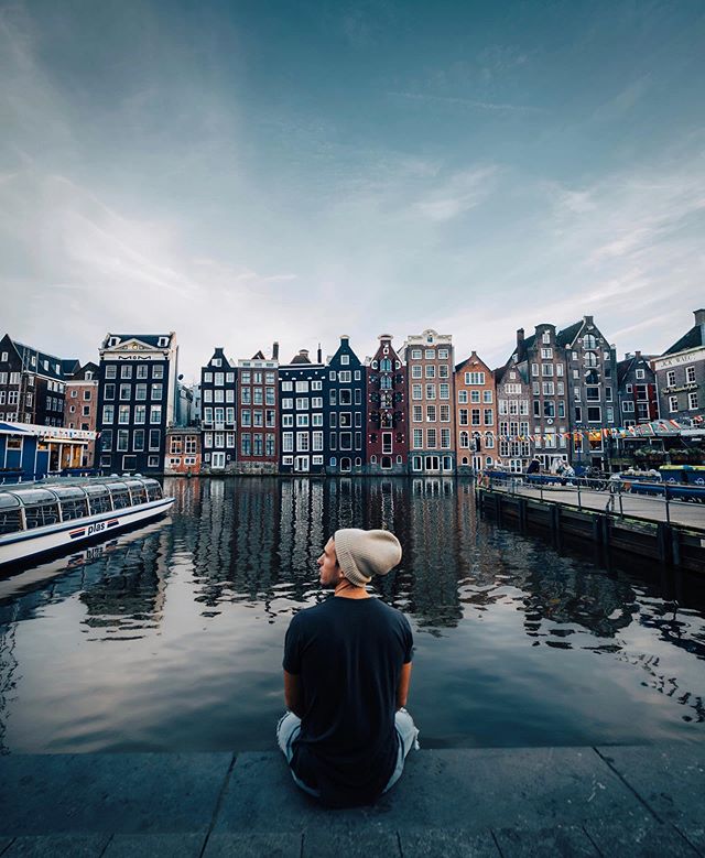 A cold morning in Amsterdam 💧
&bull;
We had one free day before my workshops in Germany, so we took a 2 hour road trip to  this iconic city. While walking past these canals I noticed these buildings to be unique &amp; loved how they slanted on to ea
