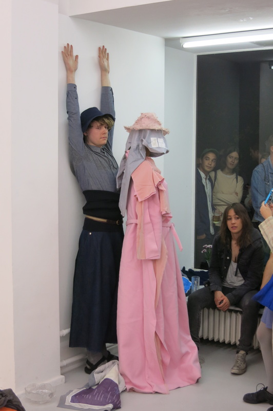  matthew linde in anna sofie bergers performance piece, 'tell me what to do' &nbsp;hbpeace shirt and atop laura fanning dress hbpeace scarf in foreground. 