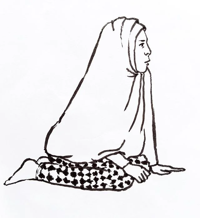 A woman in a warung in Maumere, Flores.
