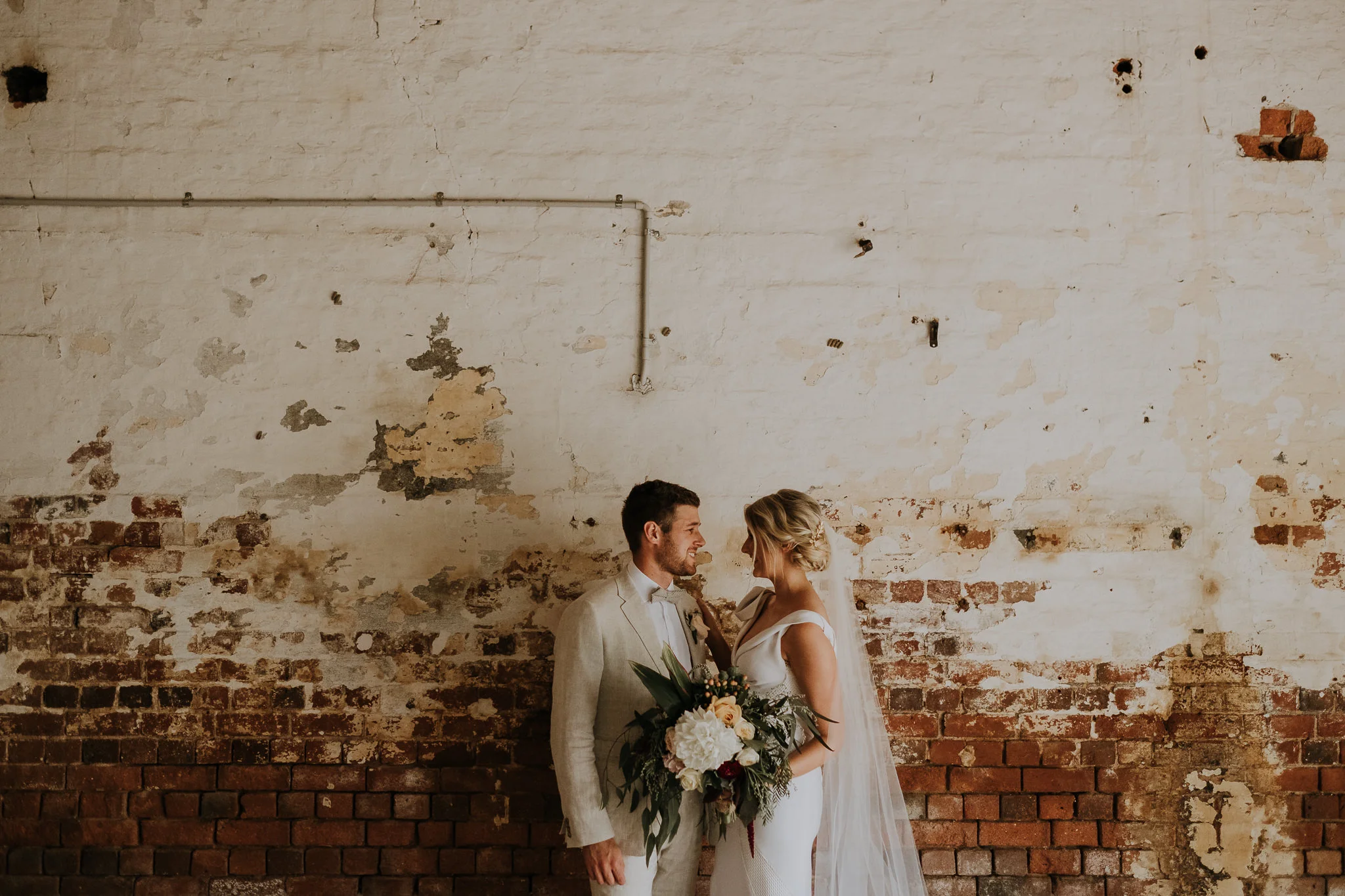 Victoria + Matt | styling and florals by Rebecca Ellie Studio. Venue Euroa Butter Factory , Victoria. Photography Daniel Milligan