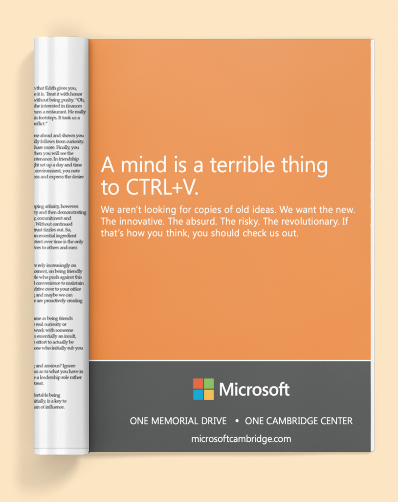 mockup-of-a-rolled-magazine-lying-flat-on-a-customizable-surface-1468-el copy.png