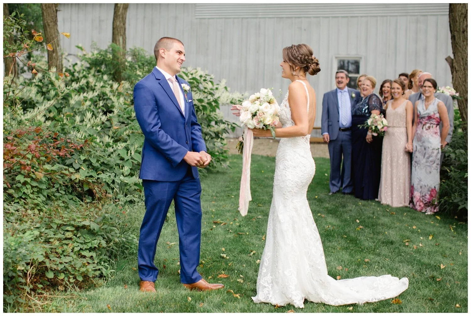 (They had a sweet first look with both of their families there too!)