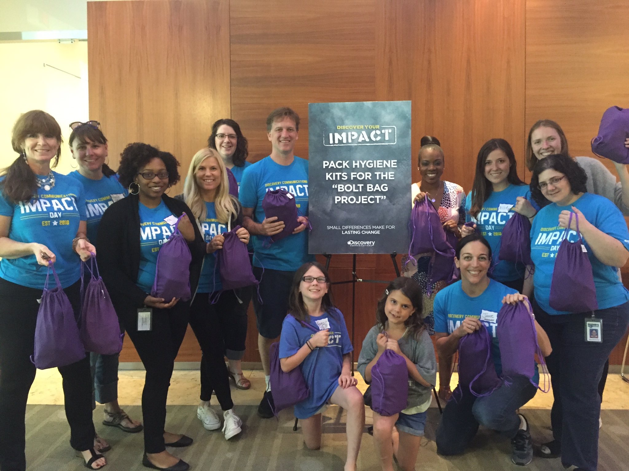  Discovery Communications employees packing Bolt Bags for Impact Day 2016! 