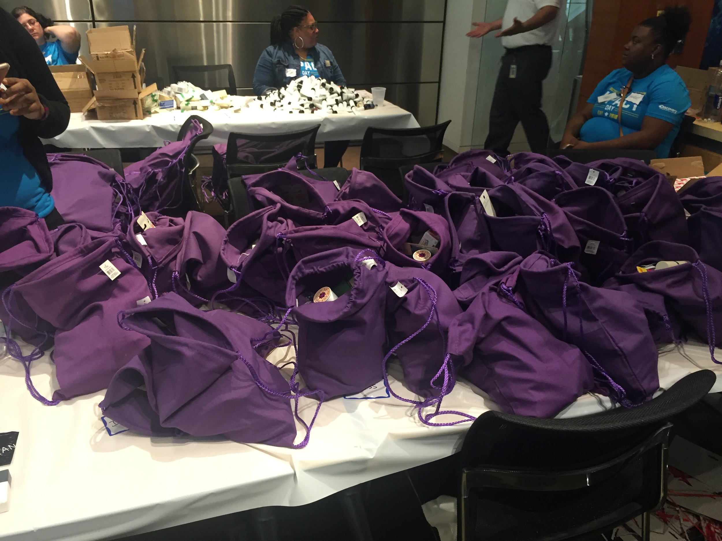  Discovery Communications employees packing Bolt Bags for Impact Day 2016! 