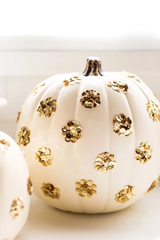 Gold sequins on a white pumpkin add a girly touch. Photo: Sugar and Cloth