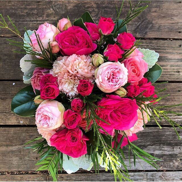 Hot pink David Austin Roses with lighter pink garden roses and dianthus to brighten up a cold winter day!