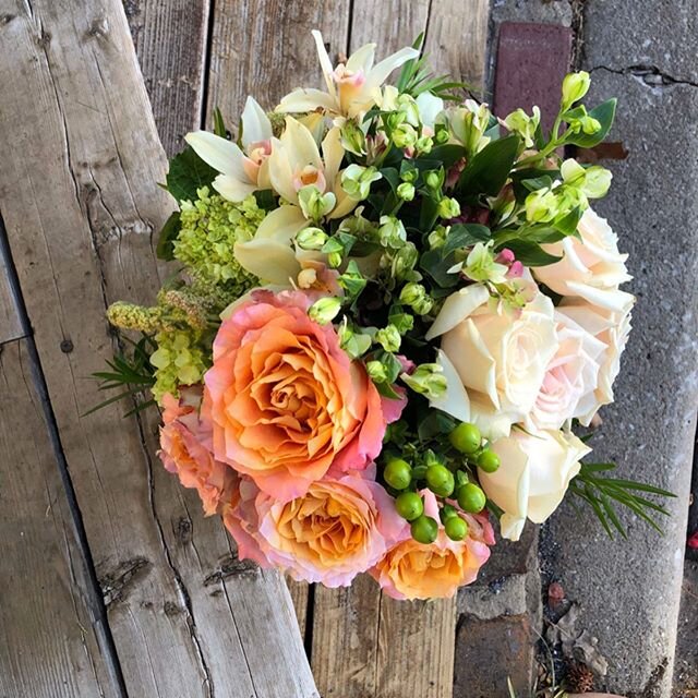 We love the vibrant pop of color that the Free Spirit rose brings to this bouquet.