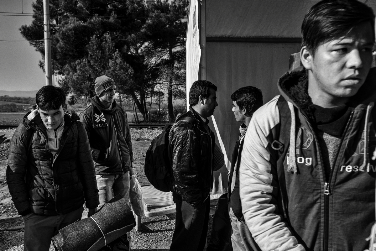  A group of afghans are waiting to cross the Greek-Macedonian border checkpoint in Idomeni. Greek police and Macedonian military has established a very tight control of the border, creating huge cues of people wanting to cross.&nbsp;After March 2016 