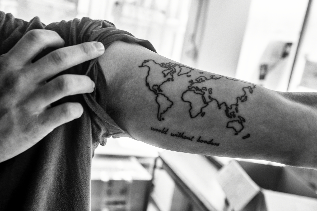  Reza (20) is a refugee from Iran that arrived to Greece 5 years ago. Now he takes his free time to help another refugees translating paperwork in a refugee squat shelter. Impressed by the wave of people arriving to Europe he decided to get a tattoo 
