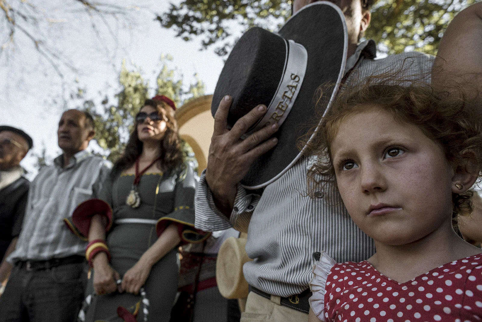 During each pilgrimage route there are known spots were pilgrims rest and perform dances, religious offerings or collective singing. A mix of South Spain folklore and religion. Hinojos, Spain, May 2015.