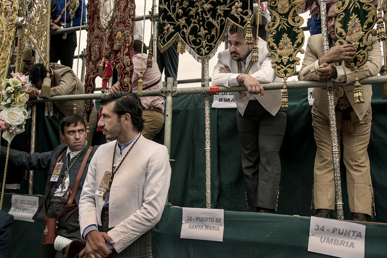 In Sunday's ceremony a person from every brotherhood holds its banner during the almost 3 hour church service. The participation of each brotherhood has to be approved by the main brotherhood of Almonte, the ones in charge. El Rocío, Spain, May 2015.