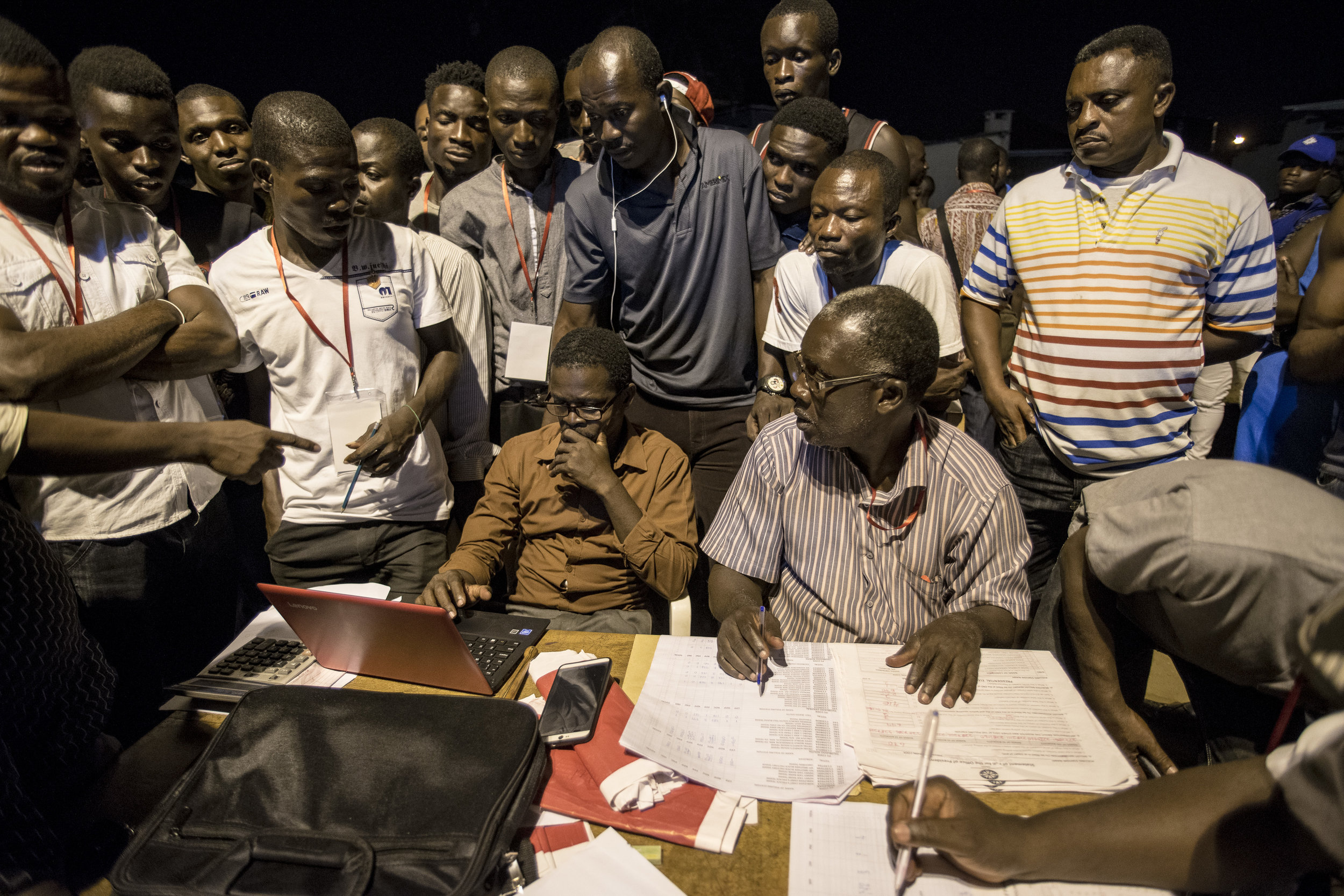  Election Commission officers gather in a Coalition Center in Teshie neighbourhood, Accra, to prepare for counting casted ballots 