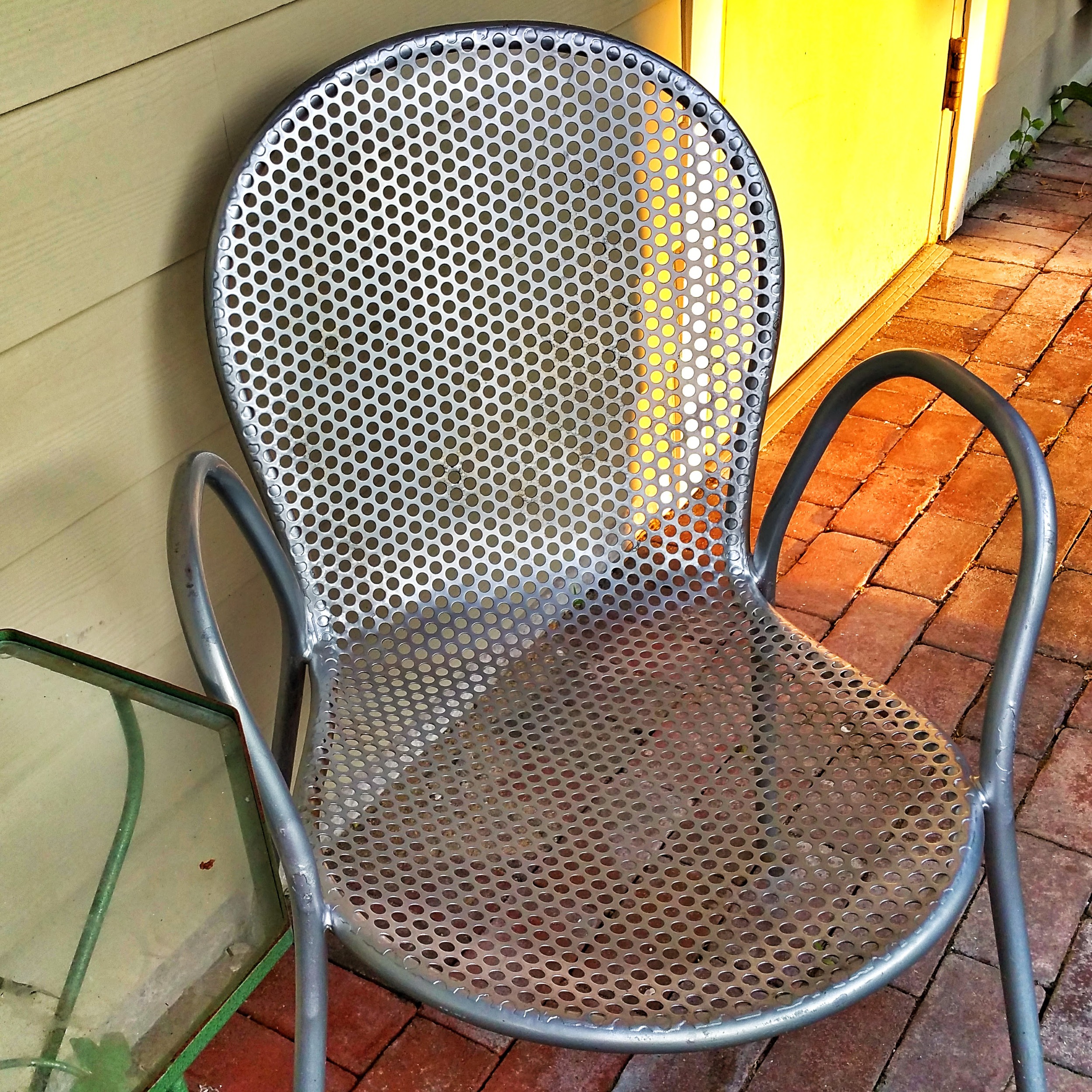 Silver Chair and Yellow Door