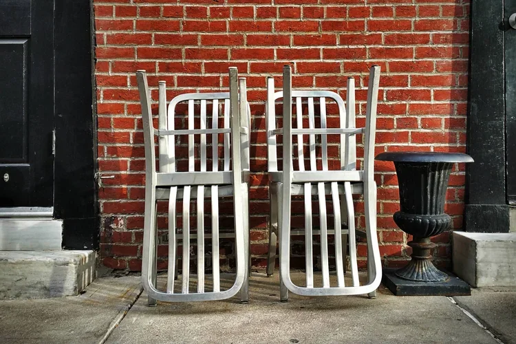 silver-chairs-and-black-urn-c.webp