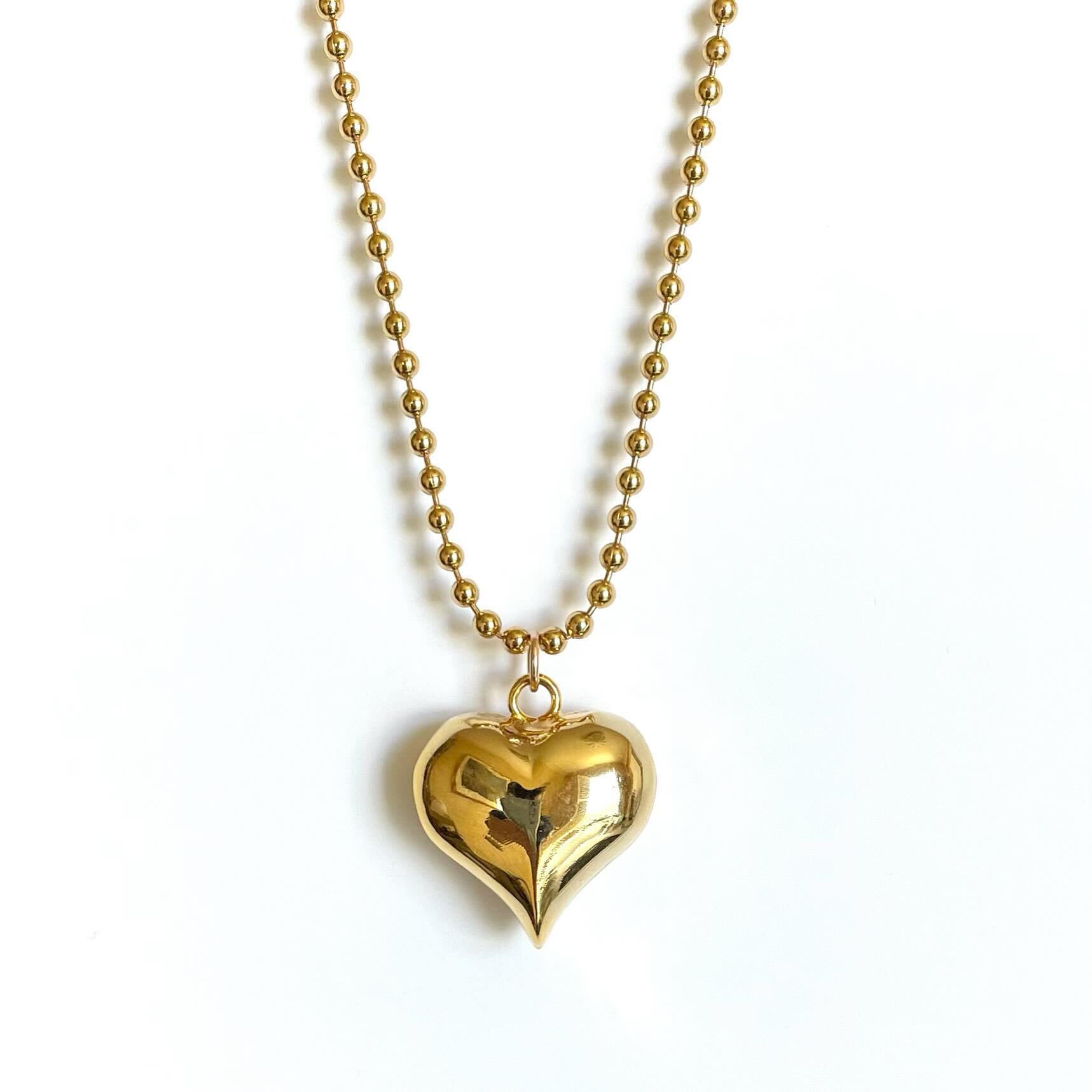 She cute! Fresh &amp; fab Puff Heart Pendant on tr&egrave;s chic Ball(er) Chain ~ online jennifertuton.com &amp; @thestoremv #heartpendant #goldchains #pendantnecklace #jewelrydesigner #sanfrancisco #localbusiness #goldjewelry #puffheartpendant #jenn