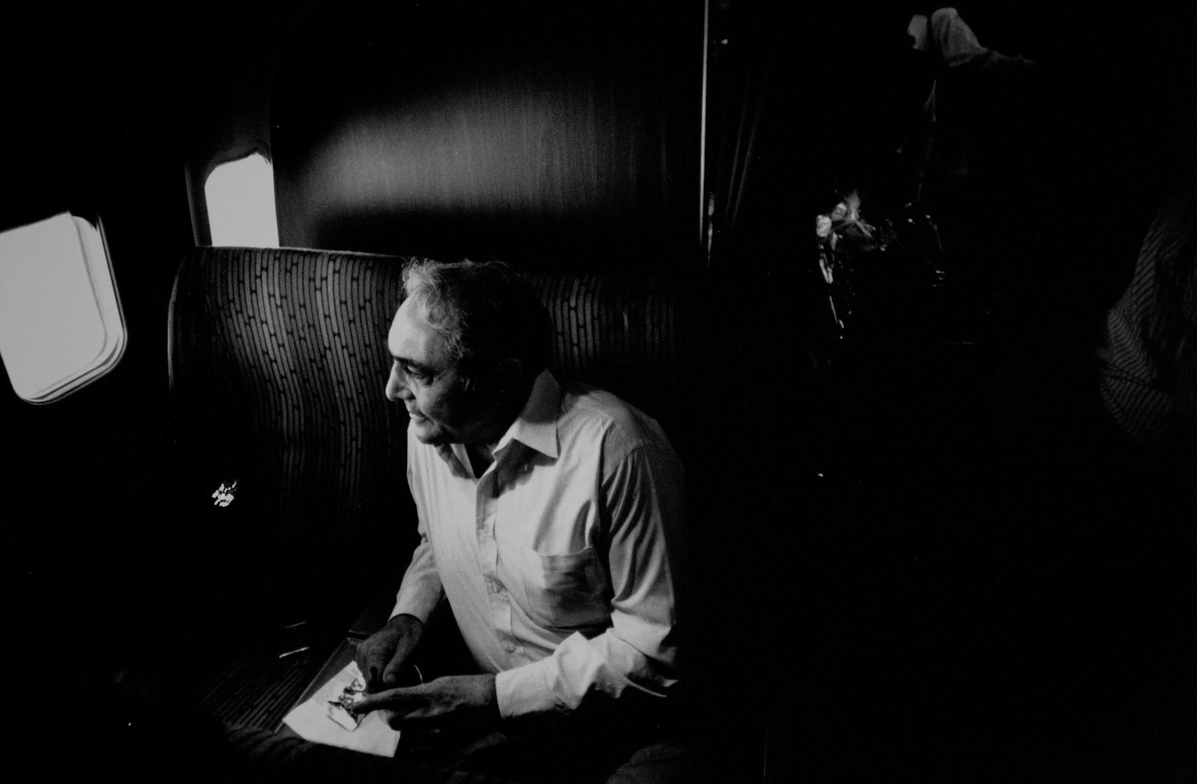Then Jersey City Mayor, Anthony Cucci, flies home from Miami after a political trip to Peru during which a train derailed, resulting in the death of his wife. Photograph by Bill Bayer. 