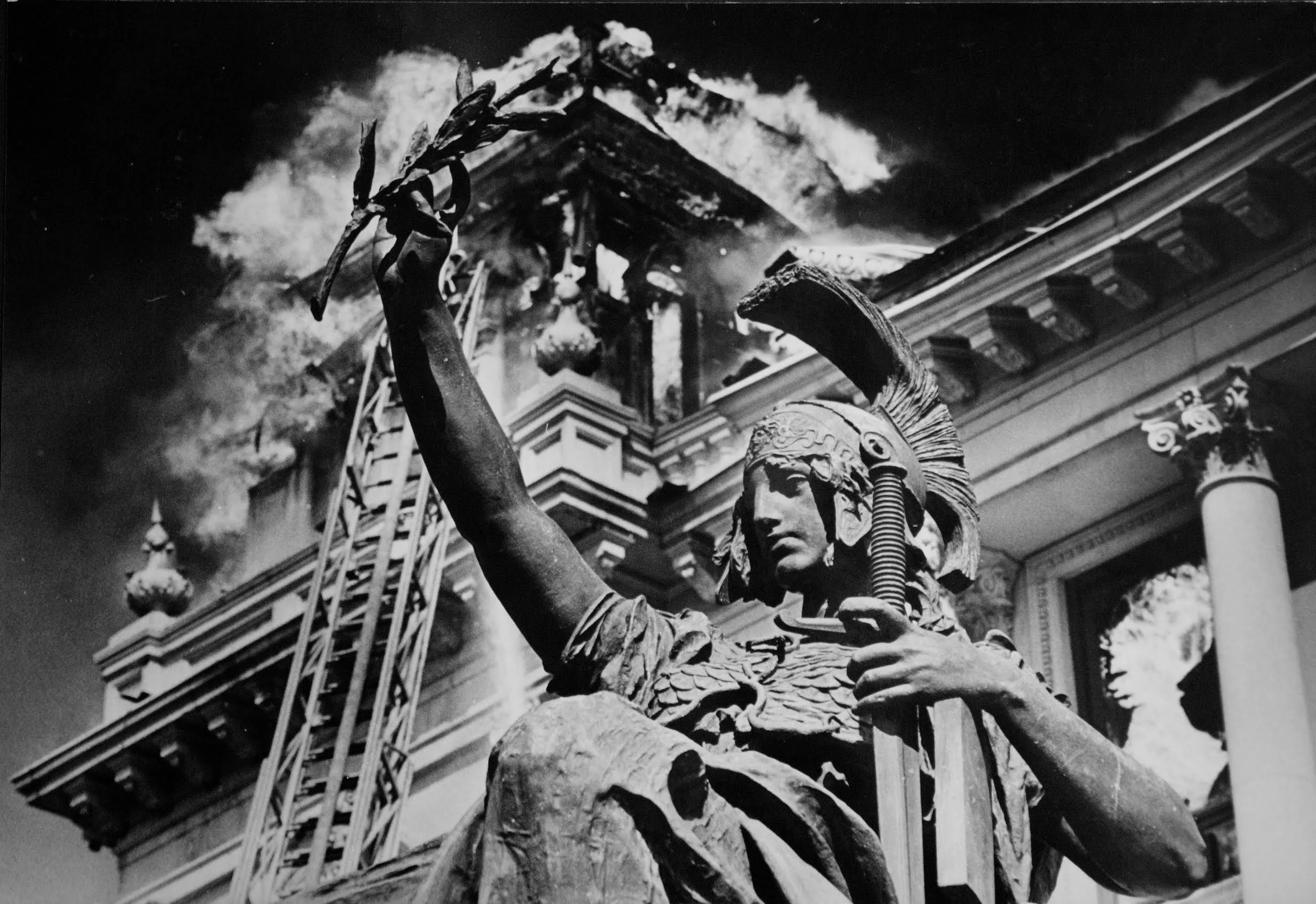 September 12, 1979. Jersey City City Hall burns during a general alarm fire, which caused severe damage to the building. Photograph by Bill Bayer. 