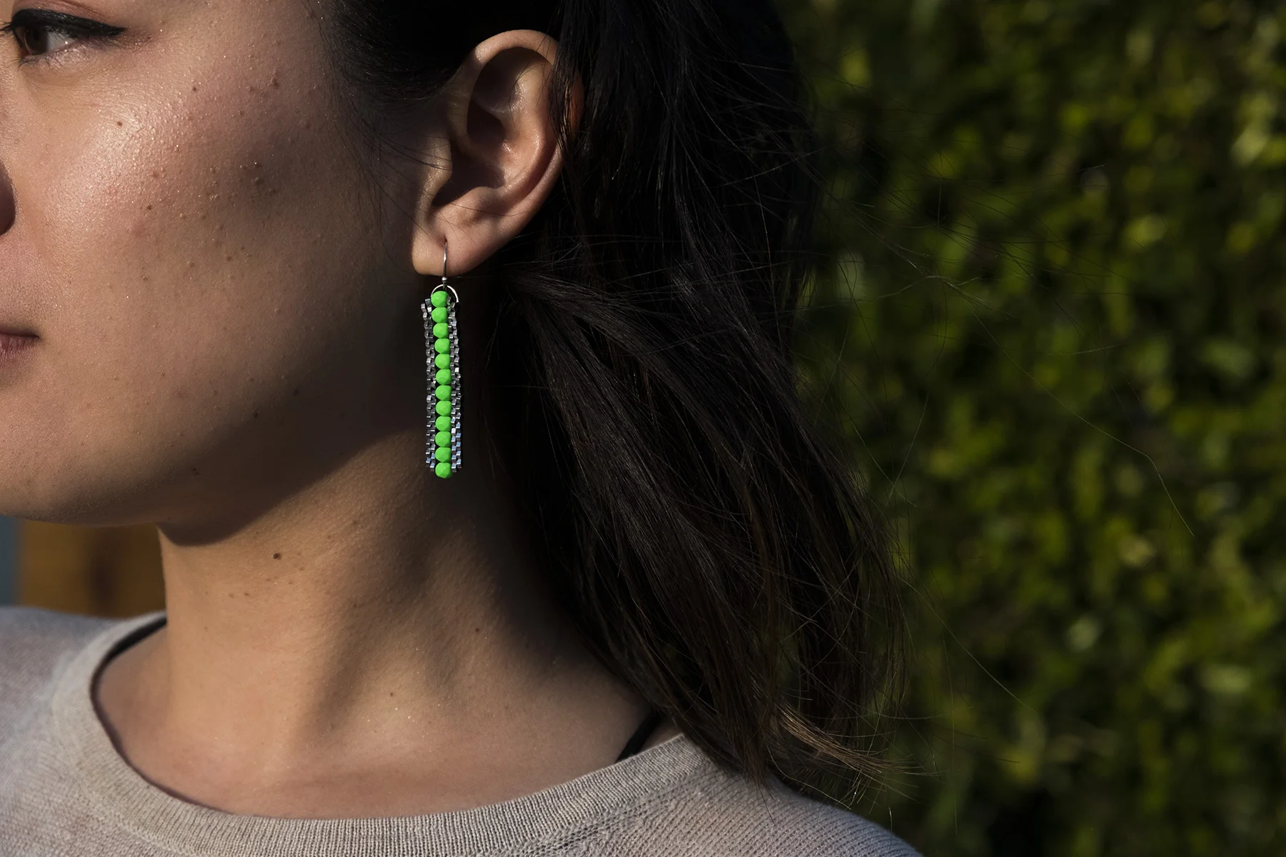 Neon Lime Feather on Model.jpg