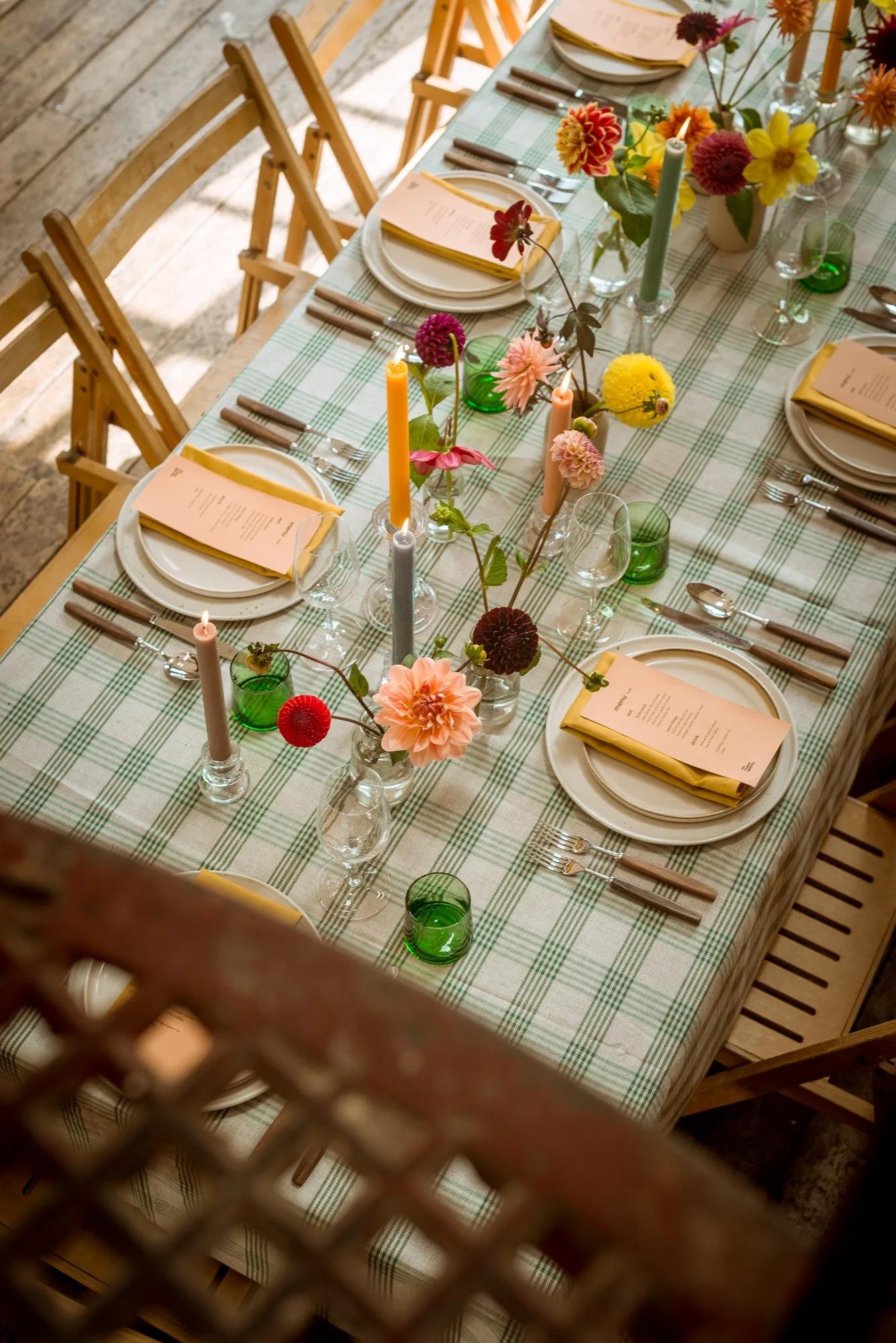 Modern colourful wedding table styling with seasonal dahlias from local south west florist at The Forge, Bristol.