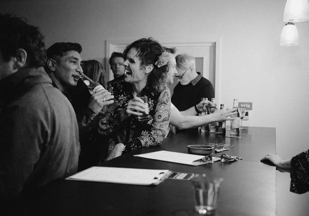 Guests enjoying drinks at a bar during a company party at The Forge Bristol