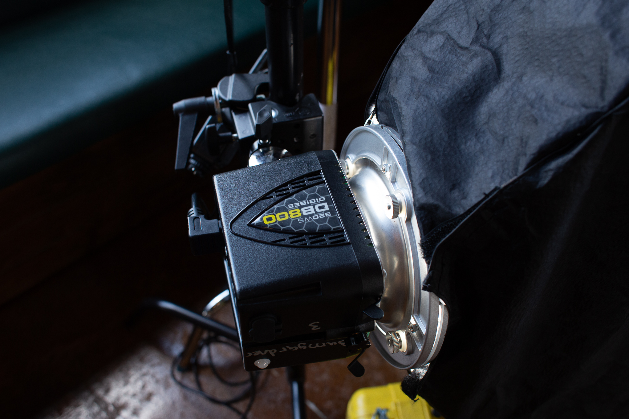 The DigiBee 800 in action. The light was mounted with a super clamp because my 20in c stand was a bit to tall to get the light where I wanted it. The yellow case is actually propping the strip box up to get it angled just right. Even when you have all of the gear you have to come up with solutions to problems on the fly.