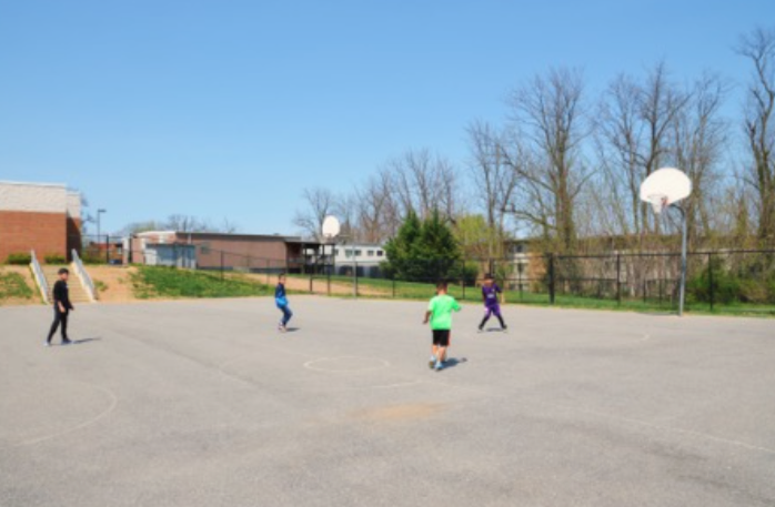 Students playing a soccer game