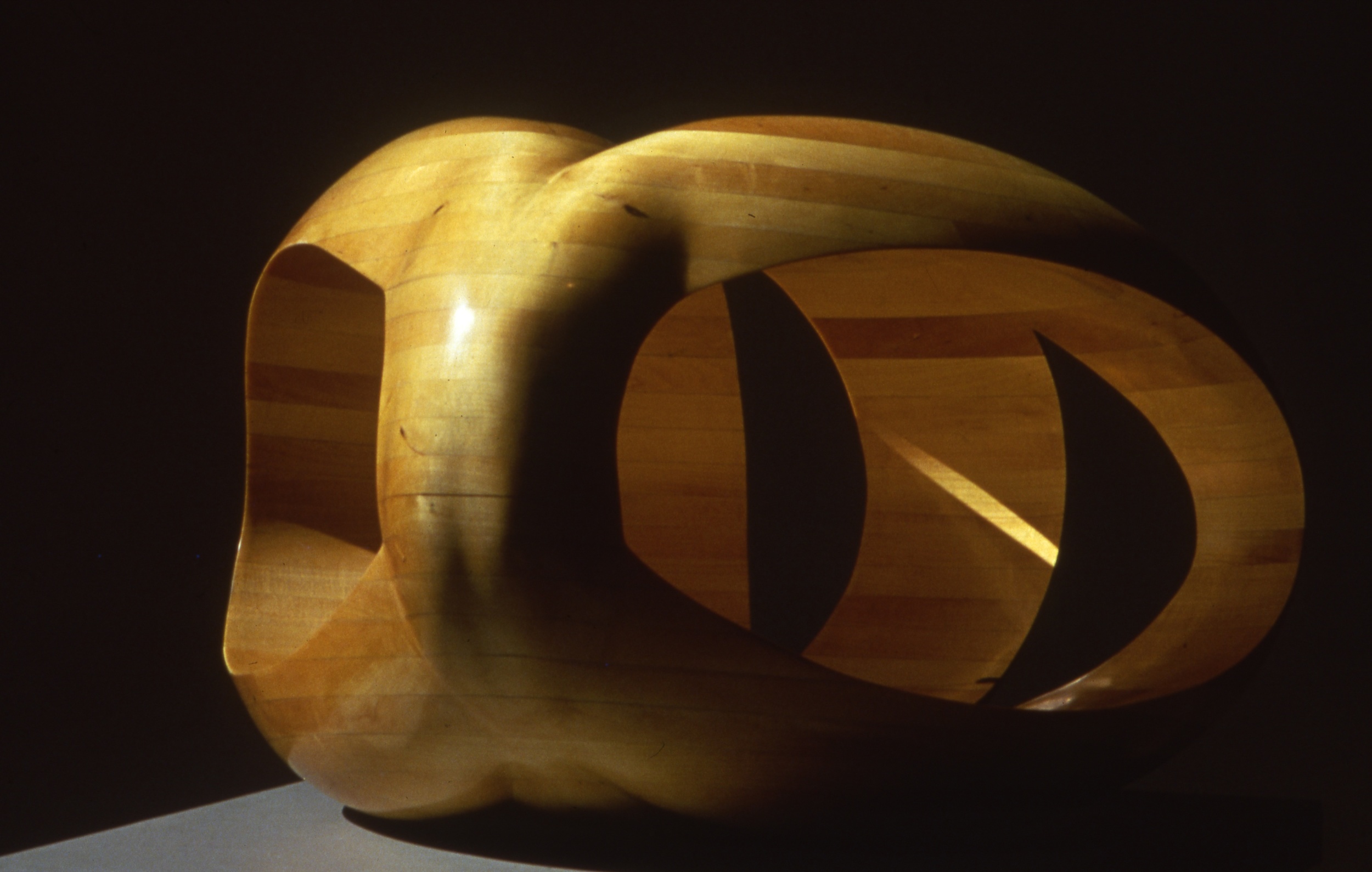 Tetrad , 1984. Laminated wood. 16”h x 27”w x 23”D