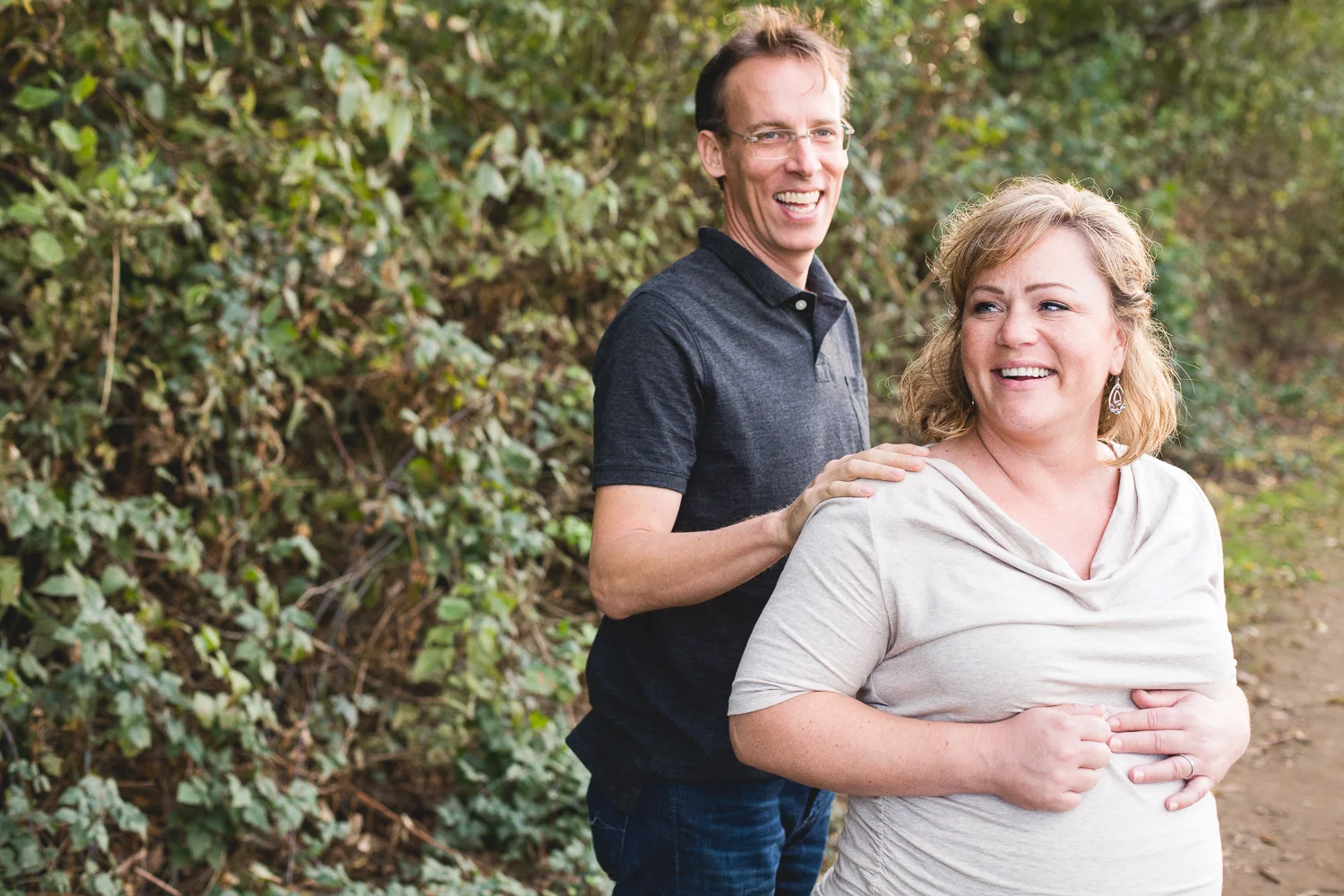 couple laughing and having fun in park
