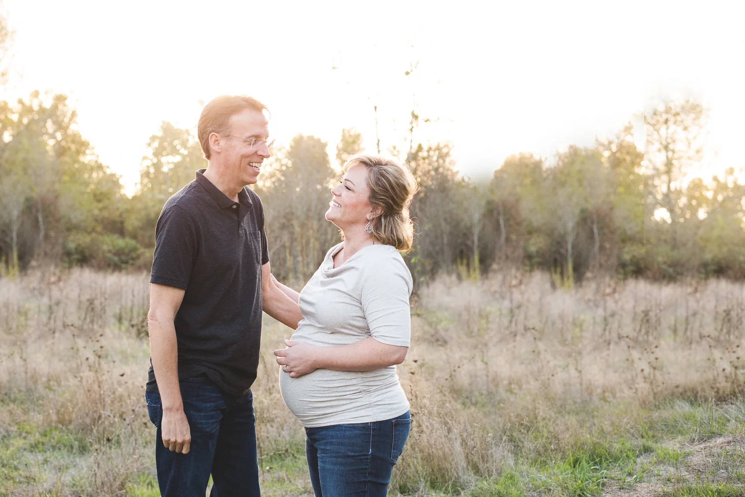 couple laughing and having fun in park