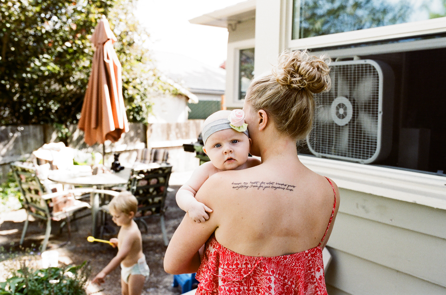 mother holding baby daughter