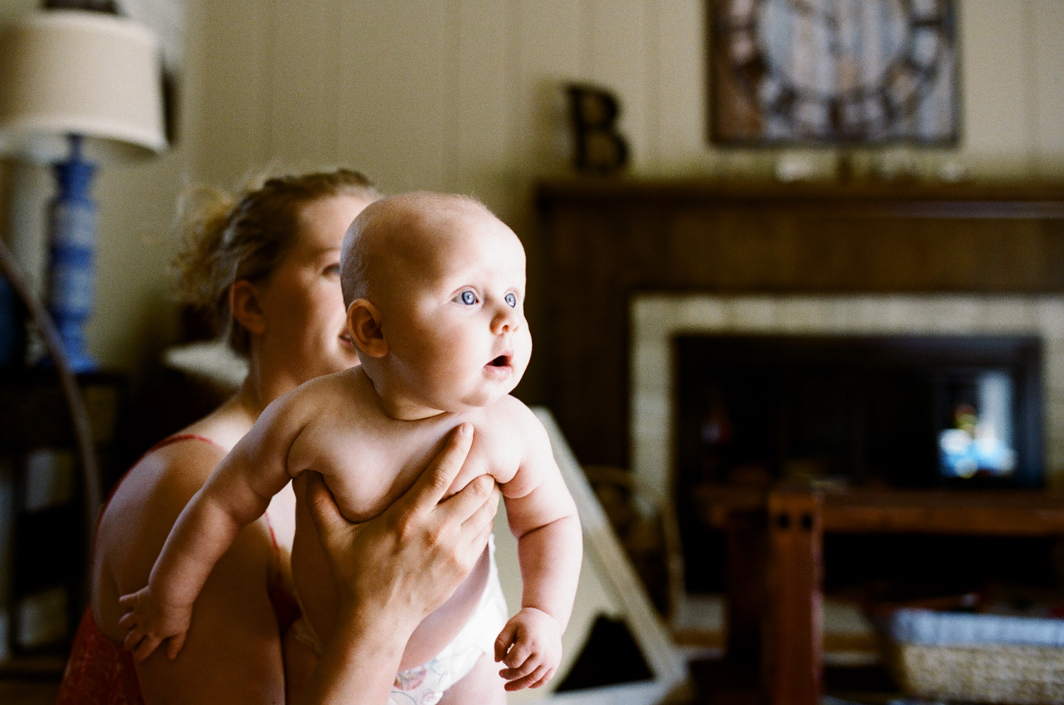 mom holding beautiful baby girl