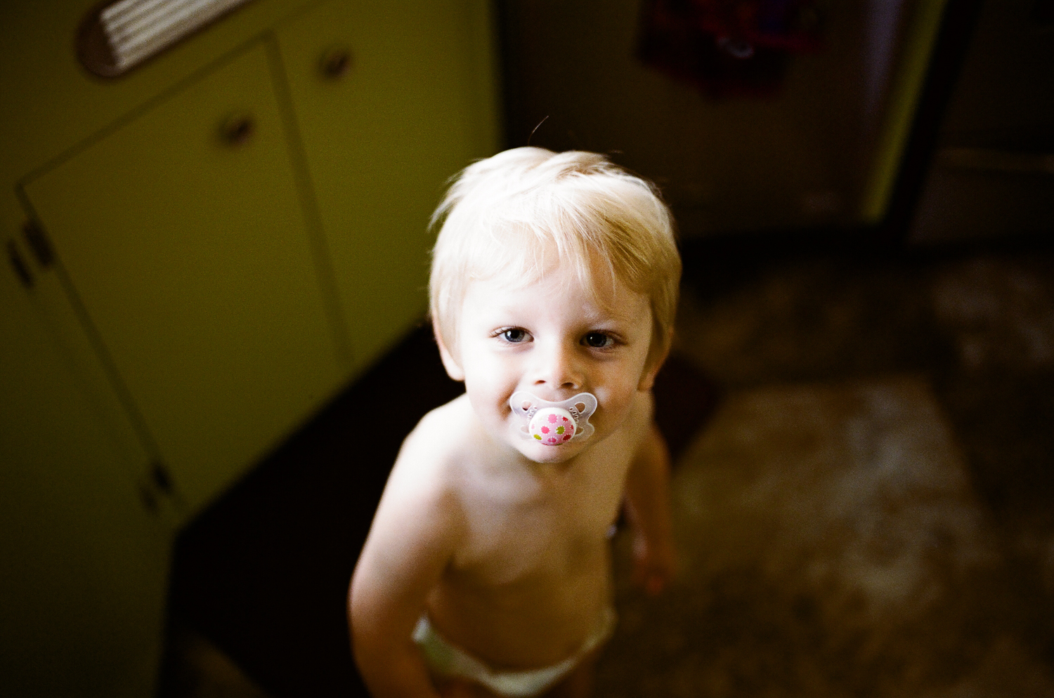 portrait of toddler boy at home
