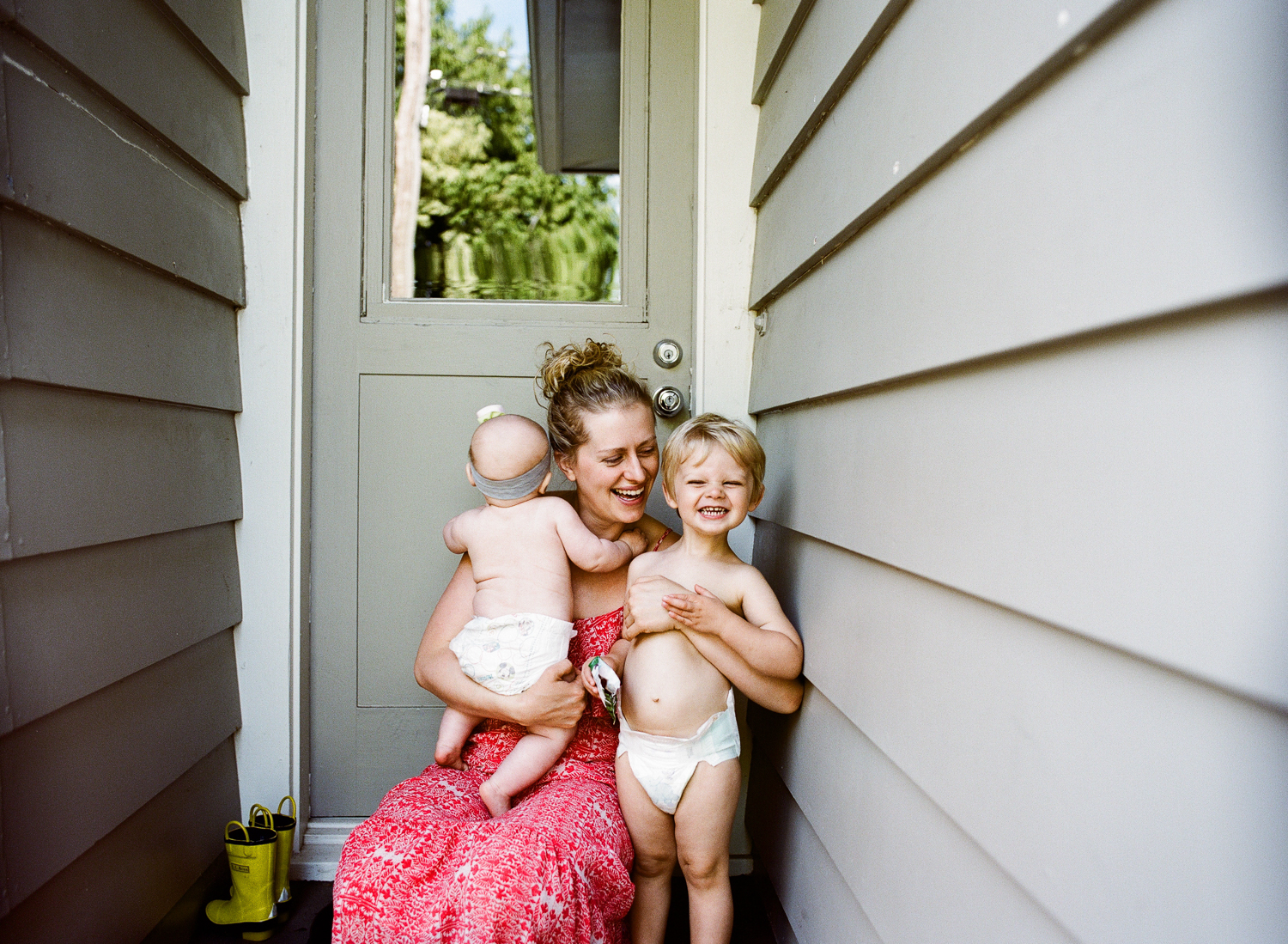 mother and kids at door