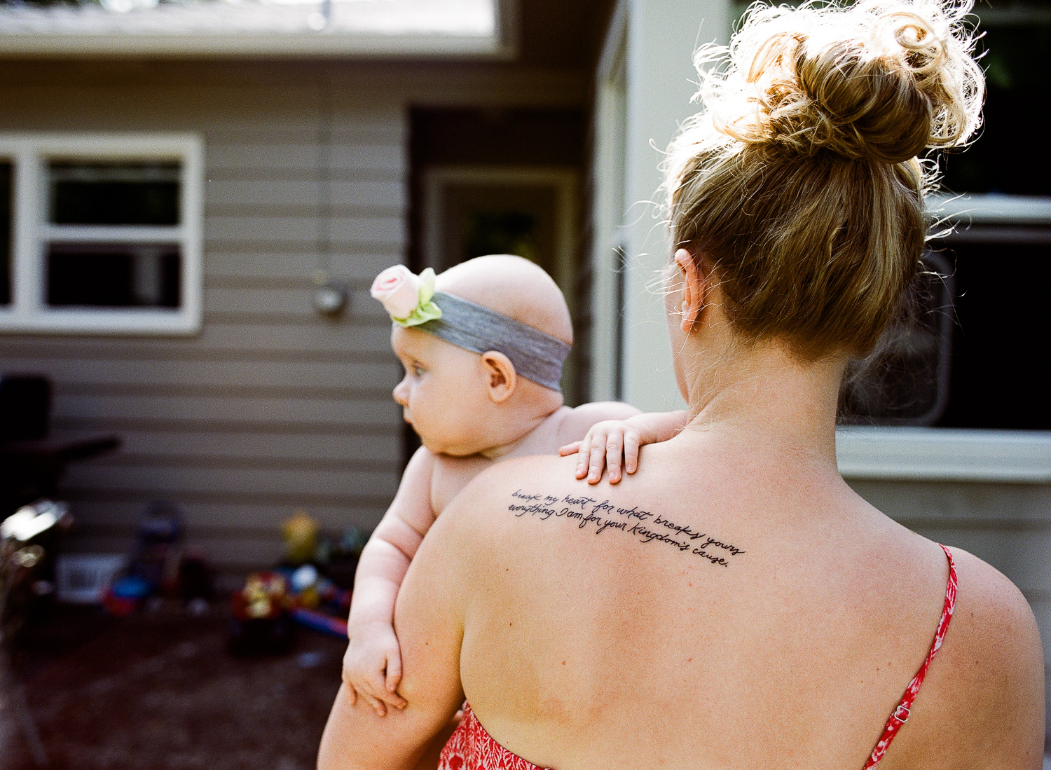 mother holding baby daughter