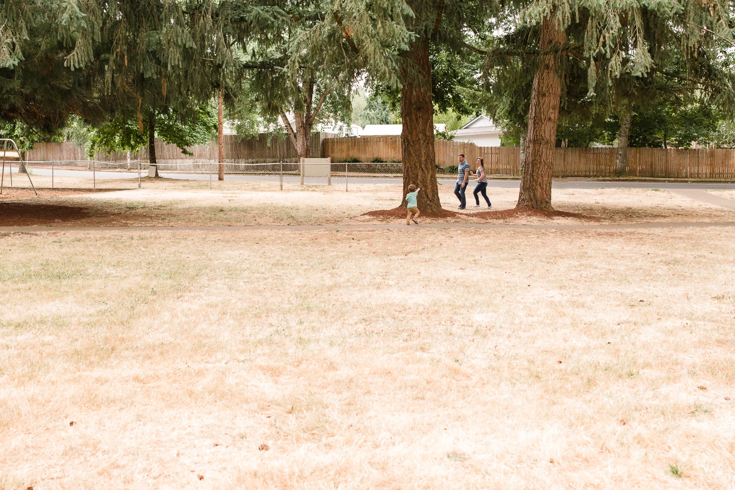 family playing hide and go seek