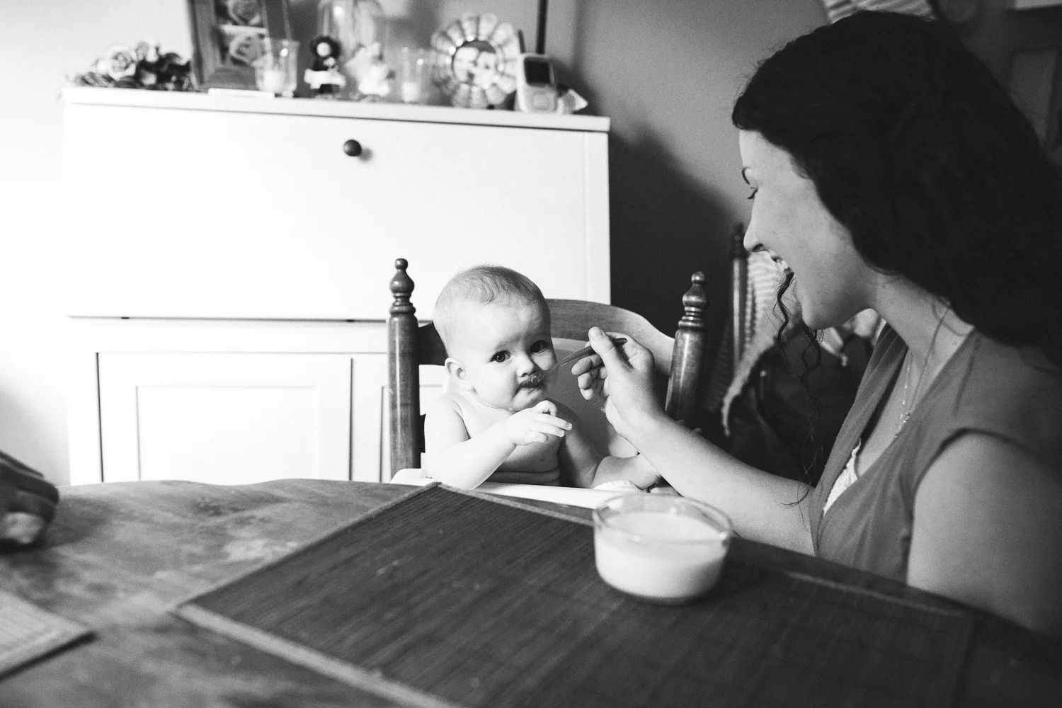 infant eating baby food