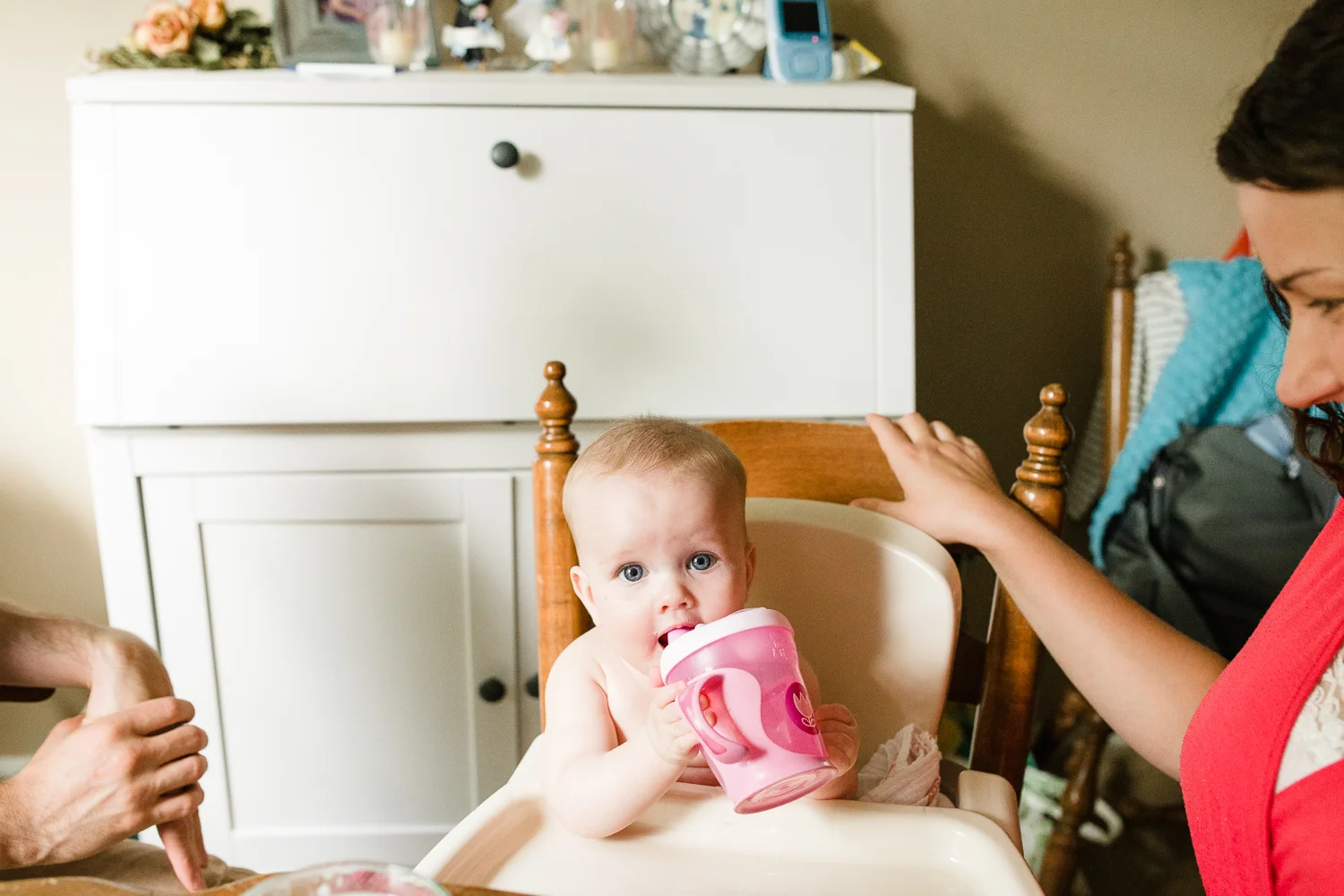 infant eating baby food