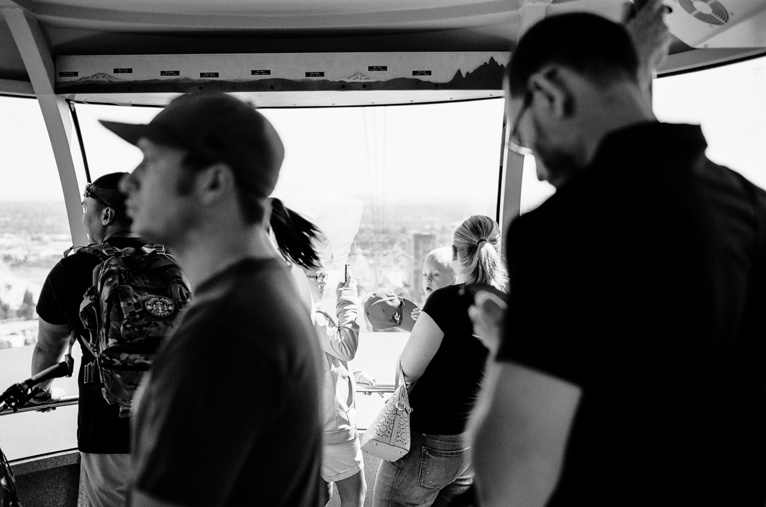Family riding the Portland Tram