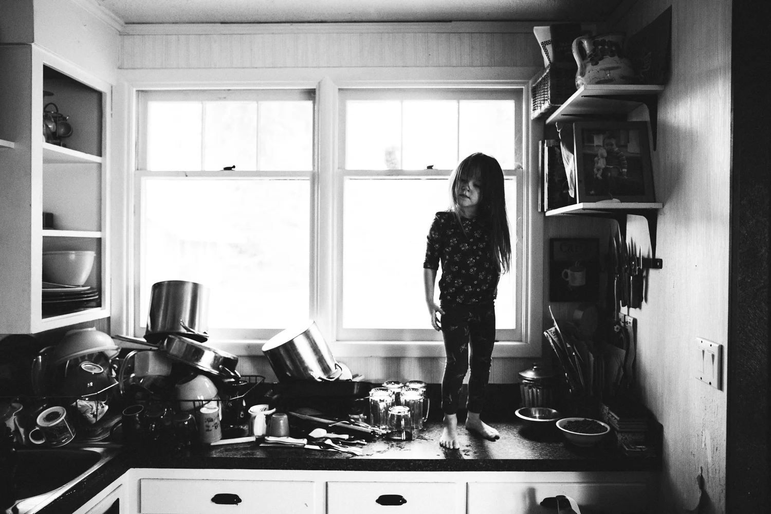 girl with long brown hair on counter