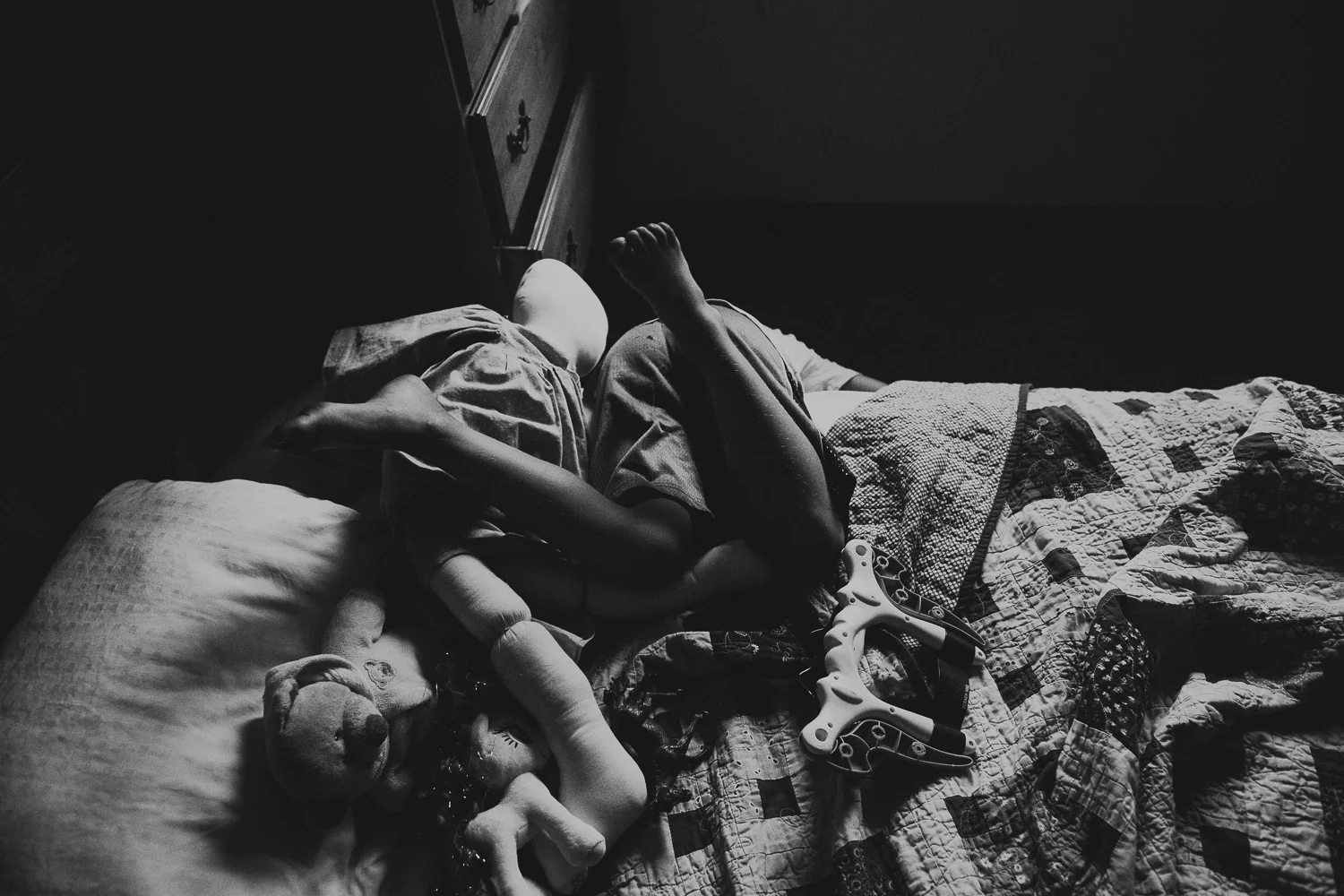 boy playing on bed