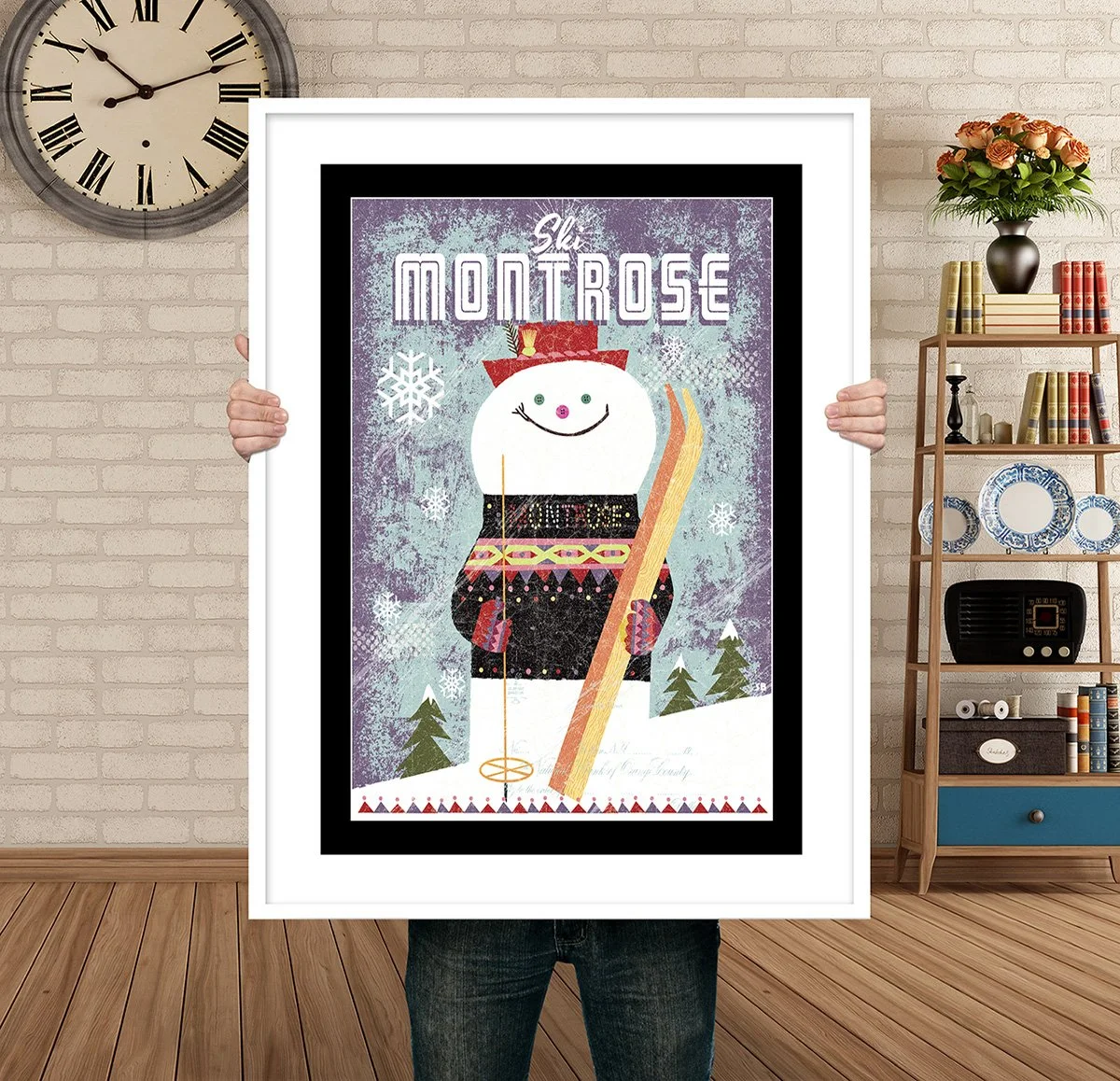 Man Holding Poster Mockup snowman skier montrose.jpg