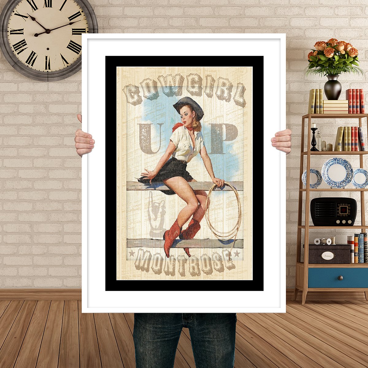Man Holding Poster Mockup Cowgirl up montrose.jpg