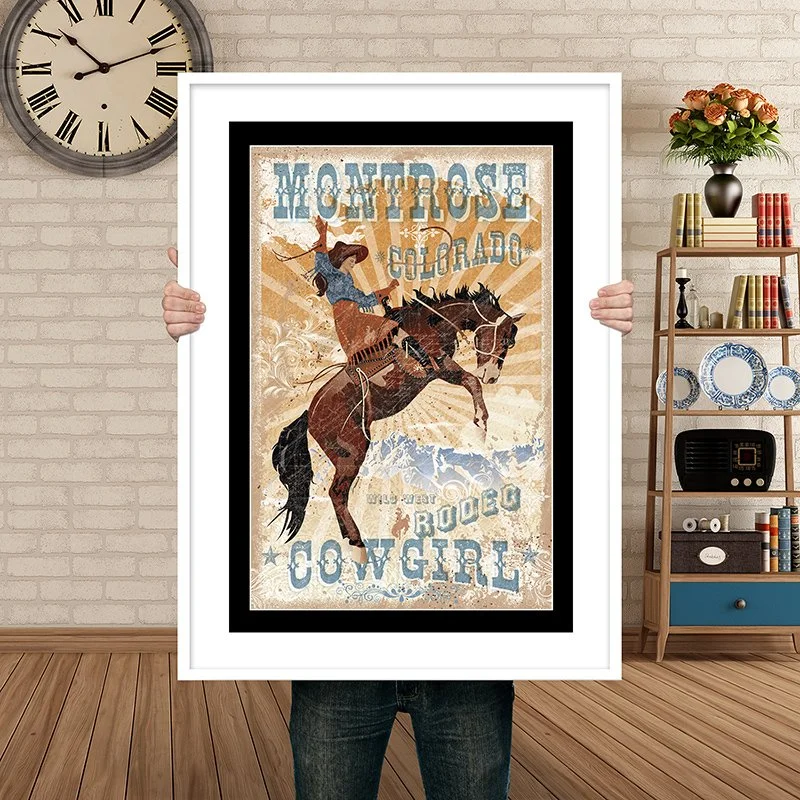 Man Holding Poster Montrose Rodeo Girl.jpg