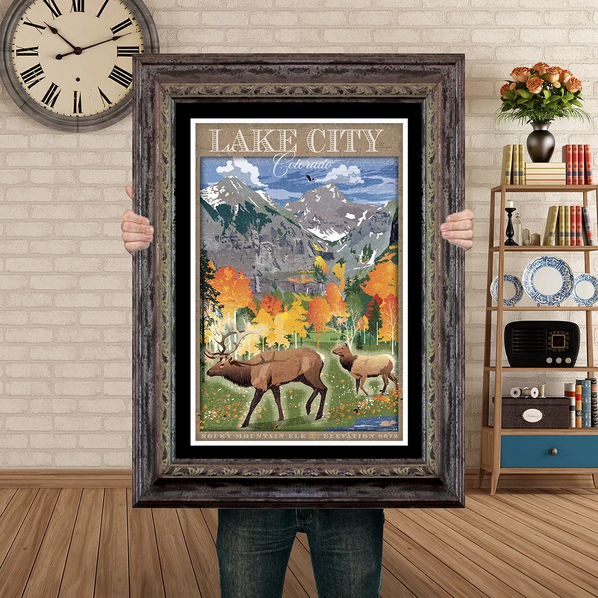 Man Holding Poster Mockup Barnwood lake city  FALL valley elk.jpg